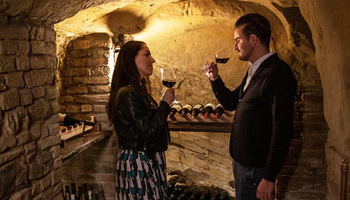 Couple's toast in a cave